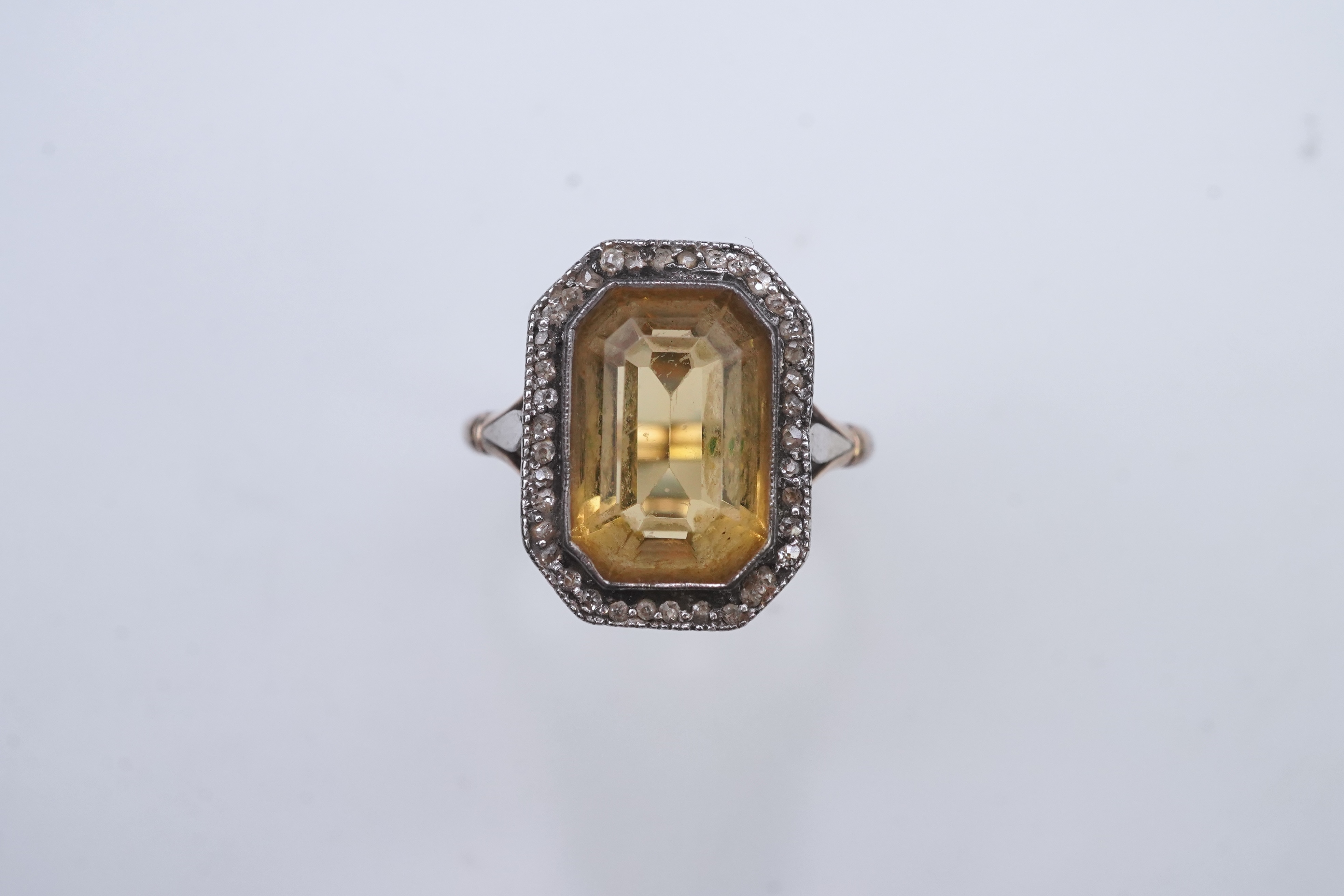 A citrine and diamond ring, early 20th century